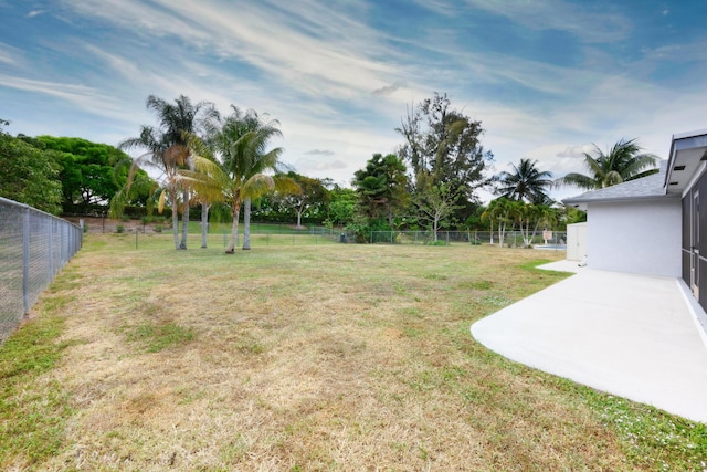 185 Bilbao St, Royal Palm Beach, FL 33411 - view of yard with a patio and fence