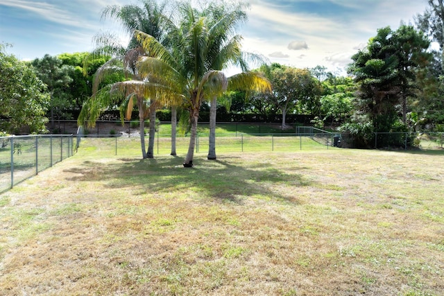 185 Bilbao St, Royal Palm Beach, FL 33411 - view of yard featuring fence