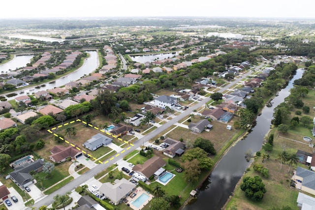 185 Bilbao St, Royal Palm Beach, FL 33411 - drone / aerial view featuring a water view and a residential view