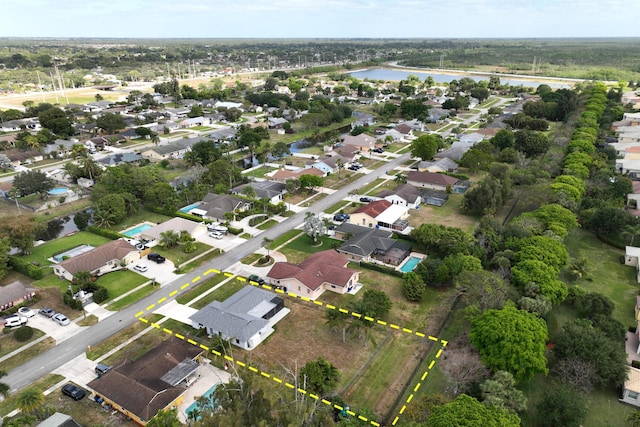 185 Bilbao St, Royal Palm Beach, FL 33411 - drone / aerial view with a residential view and a water view
