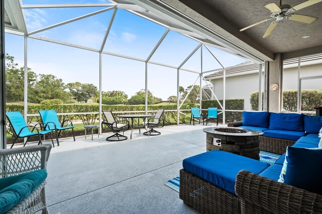 sunroom featuring view of golf course