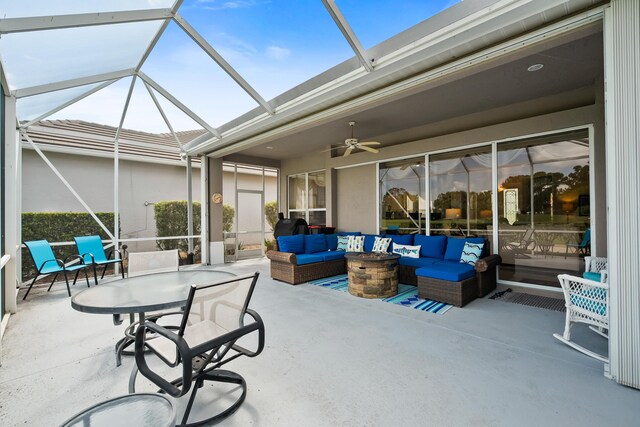 sunroom featuring golf course view and view of scattered trees