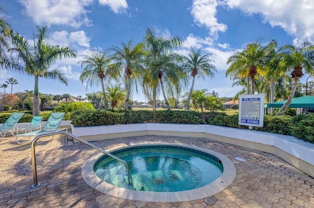 view of pool featuring a community hot tub