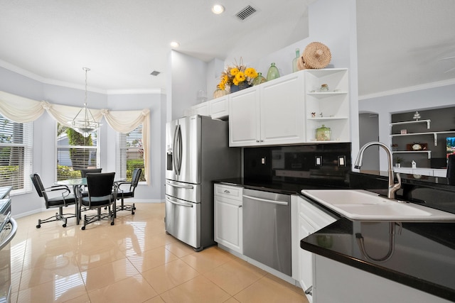 kitchen featuring stainless steel appliances, a sink, ornamental molding, open shelves, and baseboards