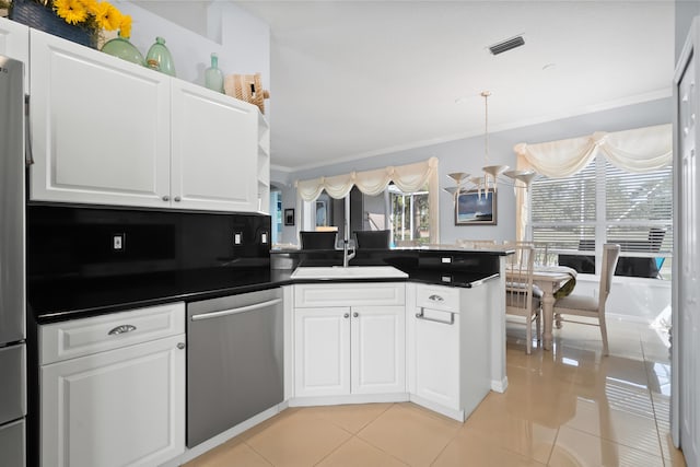 kitchen featuring stainless steel dishwasher, a sink, a peninsula, ornamental molding, and light tile patterned floors