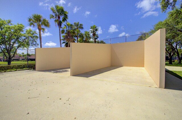 view of patio featuring fence