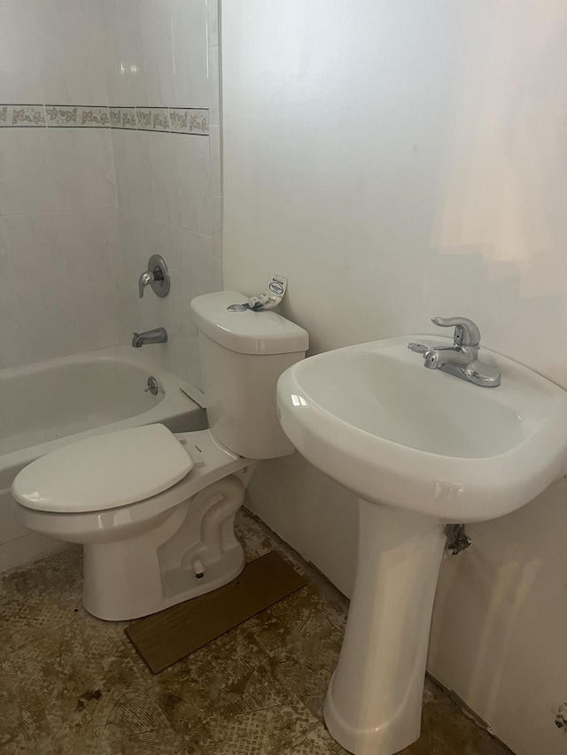 full bath with  shower combination and toilet