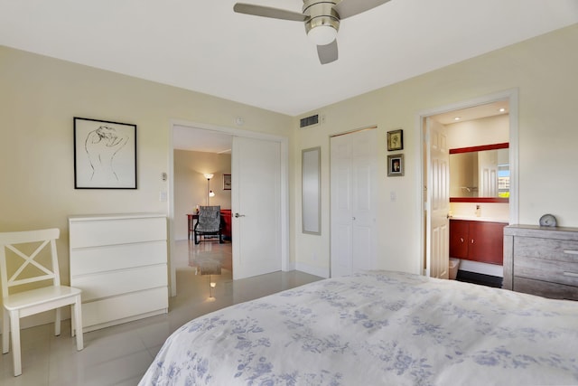 bedroom featuring connected bathroom, ceiling fan, visible vents, and tile patterned flooring