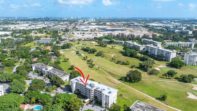 aerial view featuring a view of city and golf course view