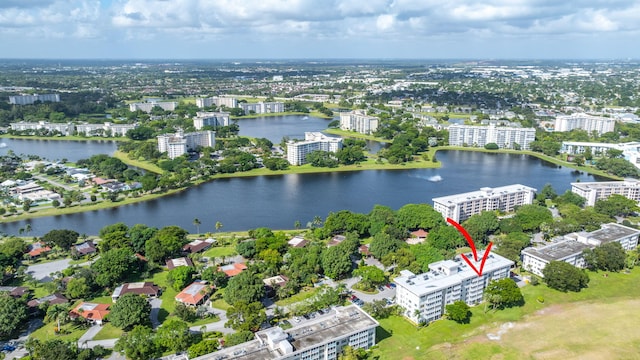 drone / aerial view with a water view and a city view