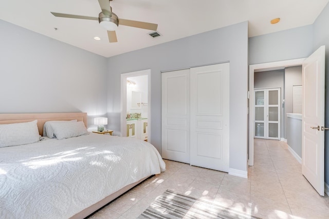75 Atlantic Grove Way, Delray Beach, FL 33444 - bedroom with a closet, light tile patterned floors, connected bathroom, and a ceiling fan