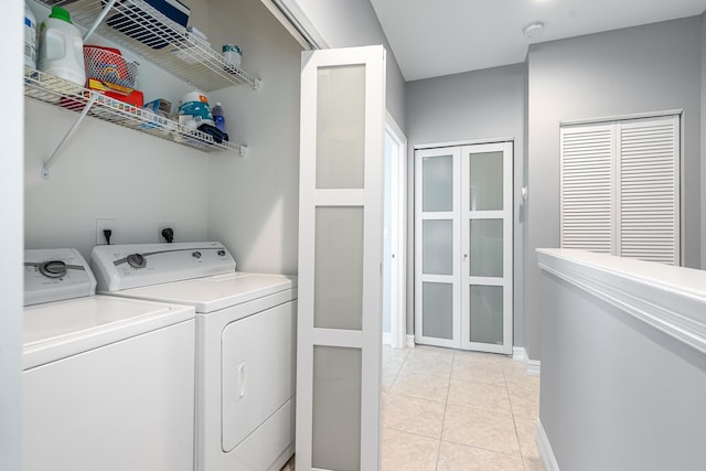 75 Atlantic Grove Way, Delray Beach, FL 33444 - laundry area with separate washer and dryer, light tile patterned floors, and baseboards