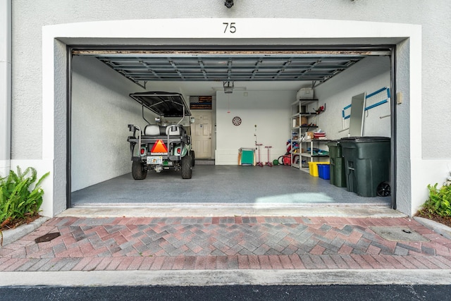 75 Atlantic Grove Way, Delray Beach, FL 33444 - garage featuring driveway