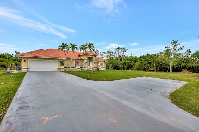 view of front of house featuring a garage, stucco siding, a tile roof, concrete driveway, and a front lawn