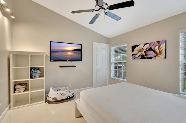 bedroom featuring lofted ceiling and ceiling fan