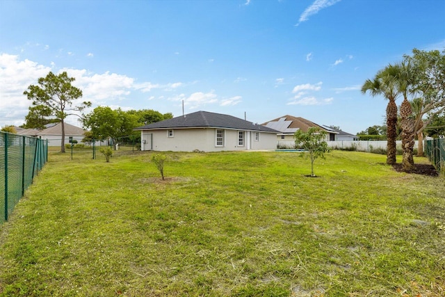 view of yard with a fenced backyard