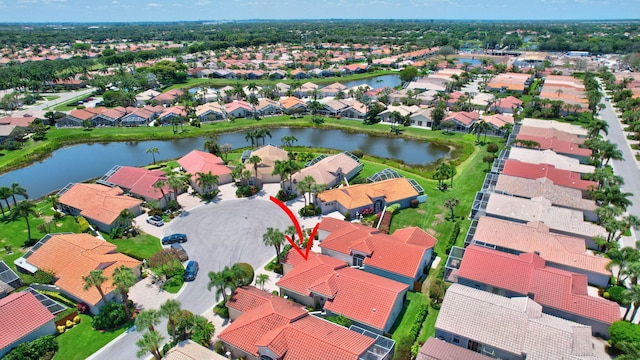 aerial perspective of suburban area with a large body of water