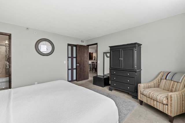 bedroom featuring visible vents