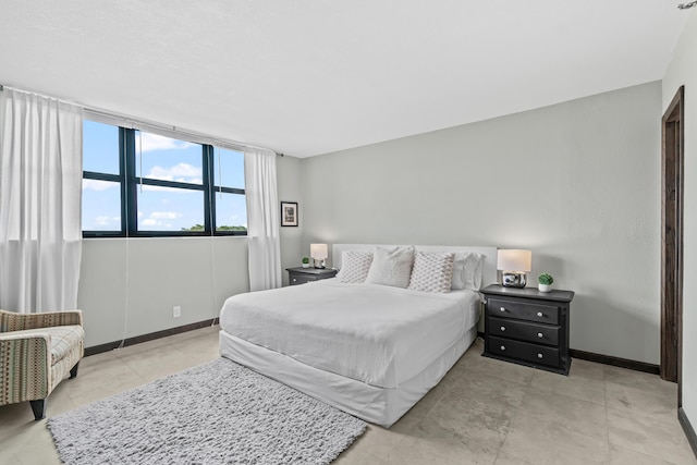 bedroom with baseboards