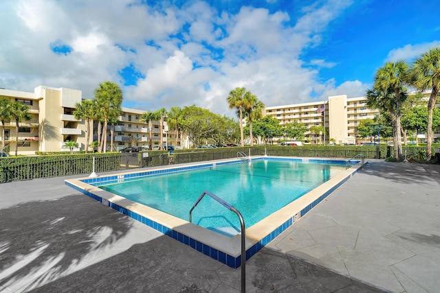 community pool with fence
