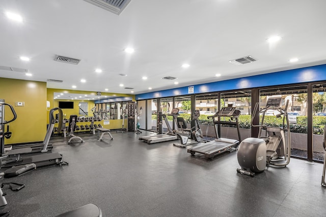 gym with recessed lighting and visible vents