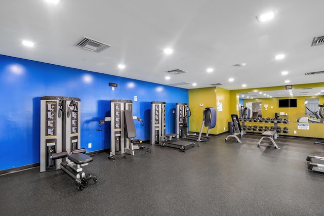 gym featuring recessed lighting and visible vents