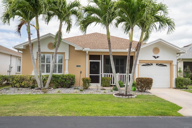 520 NW Galatone Ct, Port Saint Lucie, FL 34986 - ranch-style house featuring a garage, driveway, a front yard, and stucco siding