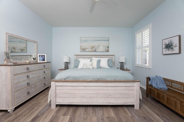520 NW Galatone Ct, Port Saint Lucie, FL 34986 - bedroom with baseboards, ceiling fan, and wood finished floors
