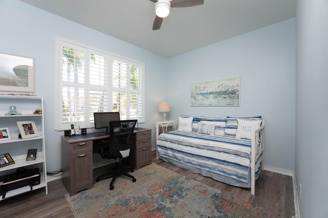 520 NW Galatone Ct, Port Saint Lucie, FL 34986 - bedroom with baseboards, a ceiling fan, and wood finished floors