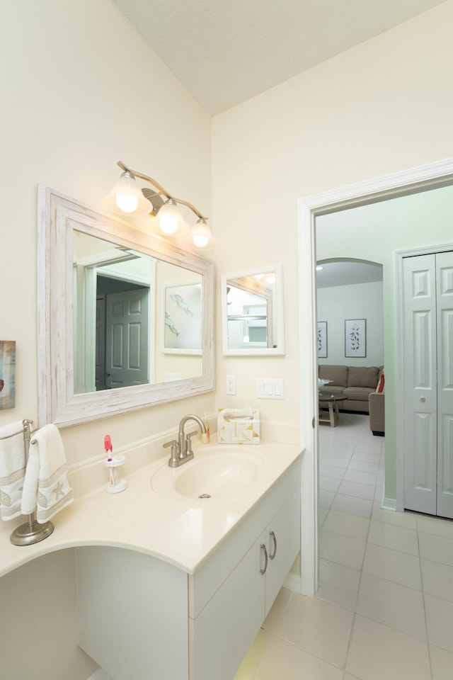520 NW Galatone Ct, Port Saint Lucie, FL 34986 - bathroom featuring vanity and tile patterned flooring