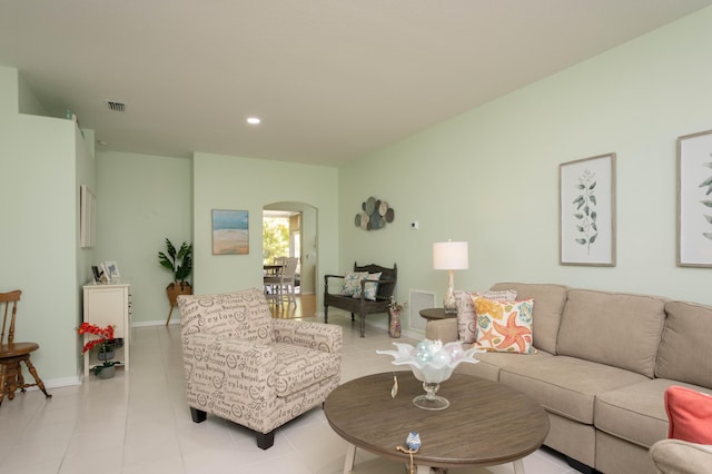 520 NW Galatone Ct, Port Saint Lucie, FL 34986 - living area with arched walkways, baseboards, visible vents, and recessed lighting
