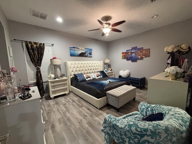 7746 99th Ct, Vero Beach, FL 32967 - bedroom featuring visible vents, recessed lighting, a ceiling fan, and wood finished floors