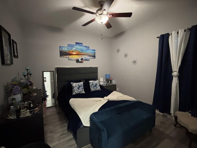 7746 99th Ct, Vero Beach, FL 32967 - bedroom with ceiling fan and wood finished floors