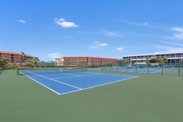 view of sport court featuring fence and community basketball court