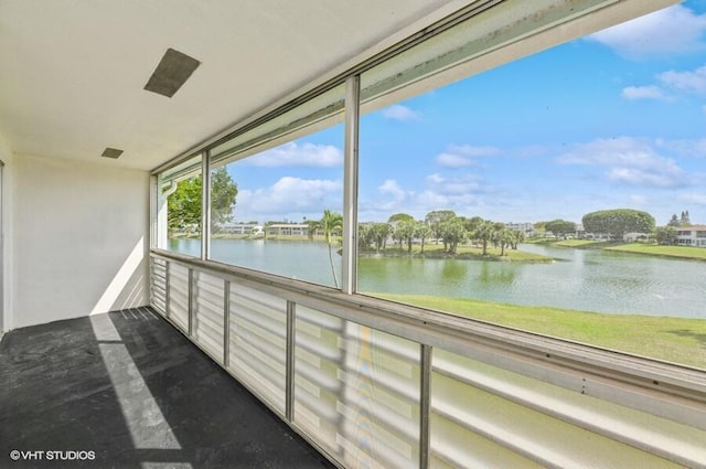 exterior space with a water view