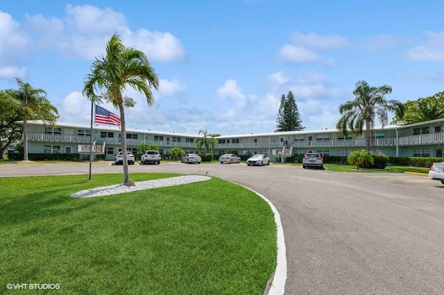 exterior space featuring uncovered parking