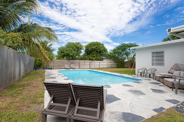 1415 W Branch St, Lantana, FL 33462 - view of swimming pool featuring a fenced backyard, a fenced in pool, a yard, and a patio area