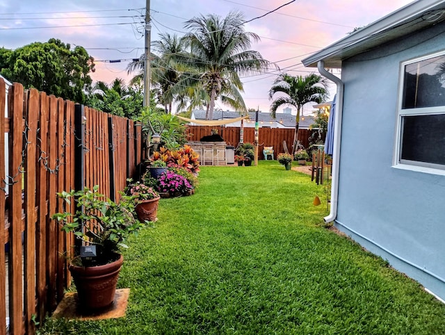 view of yard featuring a fenced backyard