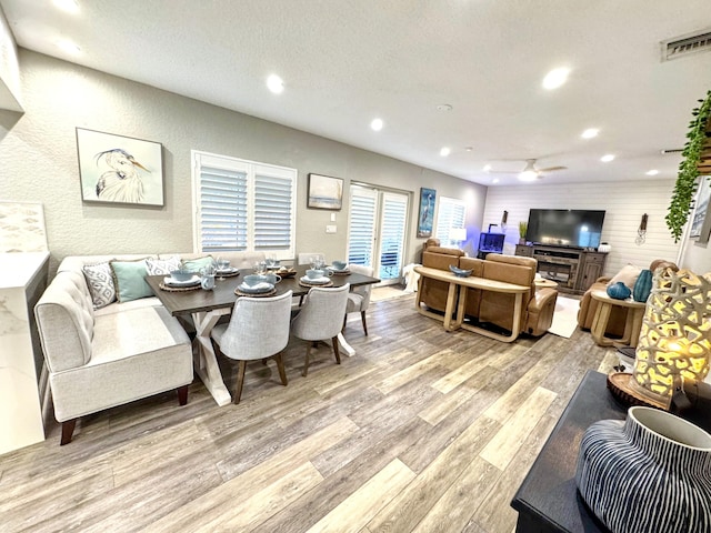 380 Laurie Rd, West Palm Beach, FL 33405 - dining space featuring light wood finished floors, recessed lighting, a ceiling fan, a textured ceiling, and a textured wall