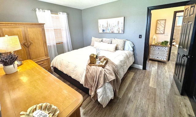 380 Laurie Rd, West Palm Beach, FL 33405 - bedroom with wood finished floors and baseboards