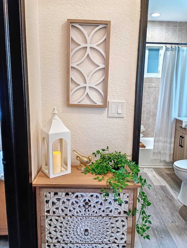 380 Laurie Rd, West Palm Beach, FL 33405 - detailed view of a textured wall and wood finished floors