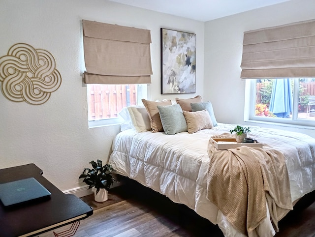 380 Laurie Rd, West Palm Beach, FL 33405 - bedroom featuring wood finished floors and baseboards