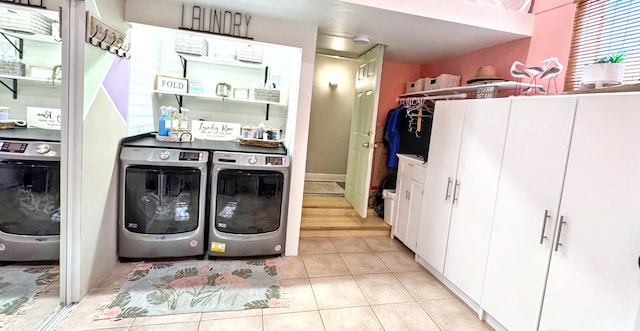 380 Laurie Rd, West Palm Beach, FL 33405 - laundry room featuring independent washer and dryer and light tile patterned flooring