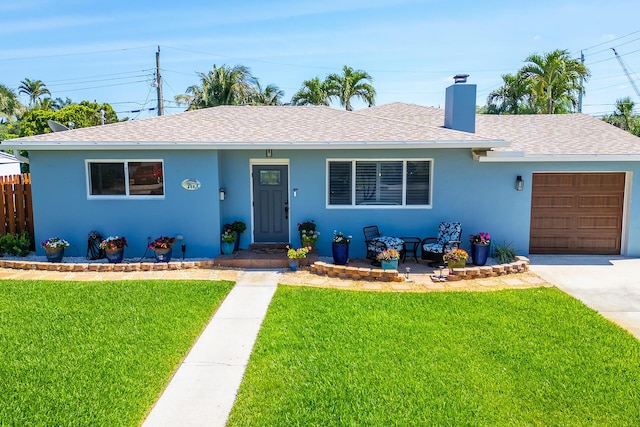 380 Laurie Rd, West Palm Beach, FL 33405 - ranch-style home featuring an attached garage, a shingled roof, and a chimney