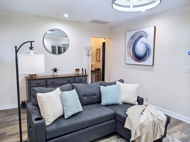 380 Laurie Rd, West Palm Beach, FL 33405 - living room featuring wood finished floors, baseboards, and recessed lighting