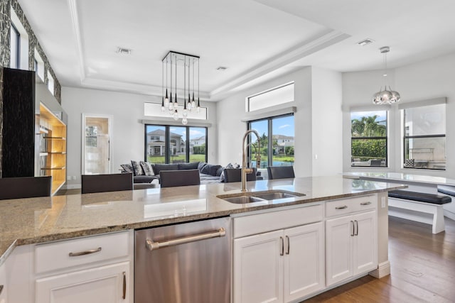 6950 NW 25th Way, Boca Raton, FL 33496 - kitchen with a sink, stainless steel dishwasher, a raised ceiling, a chandelier, and white cabinetry