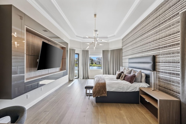 6950 NW 25th Way, Boca Raton, FL 33496 - bedroom with wallpapered walls, an accent wall, light wood finished floors, a chandelier, and baseboards