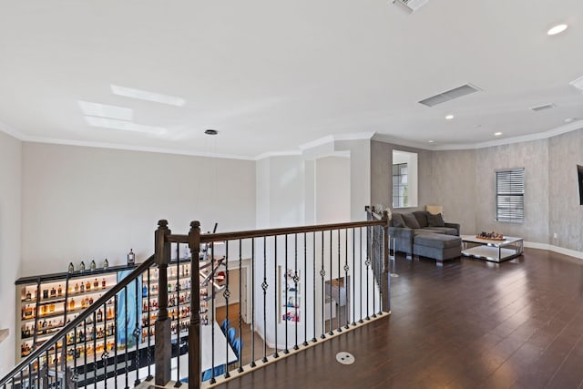 6950 NW 25th Way, Boca Raton, FL 33496 - hall with an upstairs landing, wood finished floors, ornamental molding, and recessed lighting