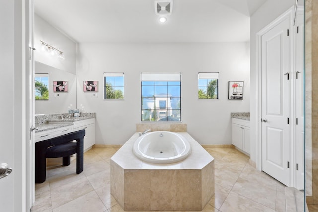 6950 NW 25th Way, Boca Raton, FL 33496 - full bathroom with vanity, a bath, and tile patterned floors