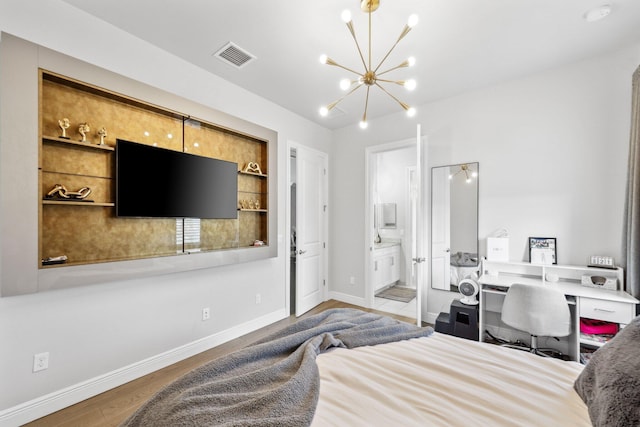 6950 NW 25th Way, Boca Raton, FL 33496 - bedroom featuring a chandelier, wood finished floors, baseboards, and ensuite bath